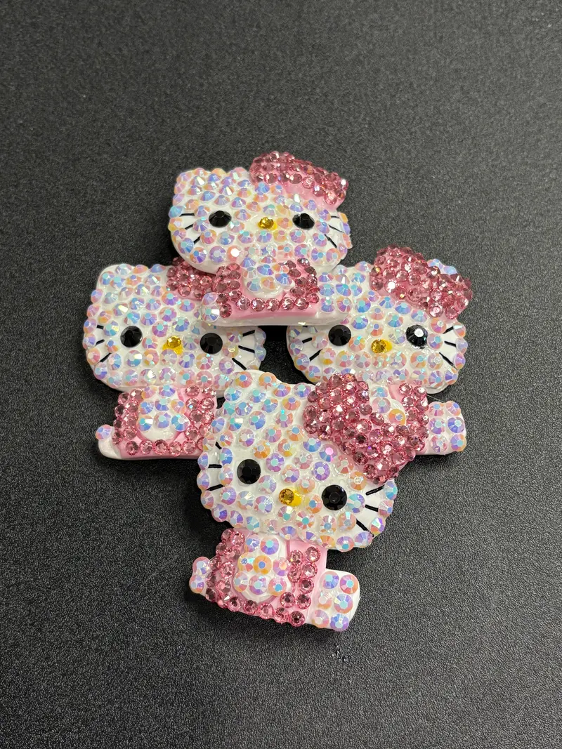 Rhinestone-Encrusted Full-Body Hk Pendant 1